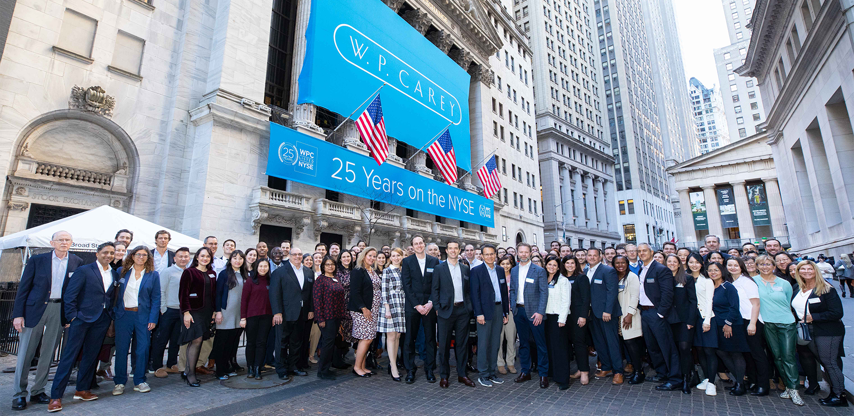 All of the New York employees gathering outside the New York Stock Exchange on the 50th anniversary of the company's founding.