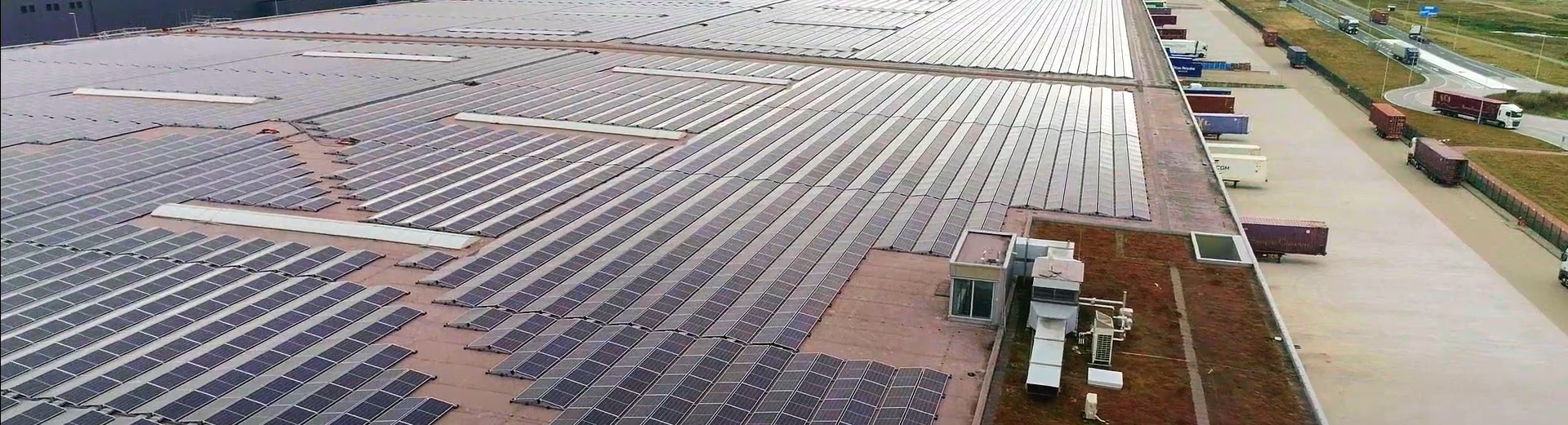 An aerial shot of solar panels on the roof of a building leased to Nippon Express and owned by W. P. Carey