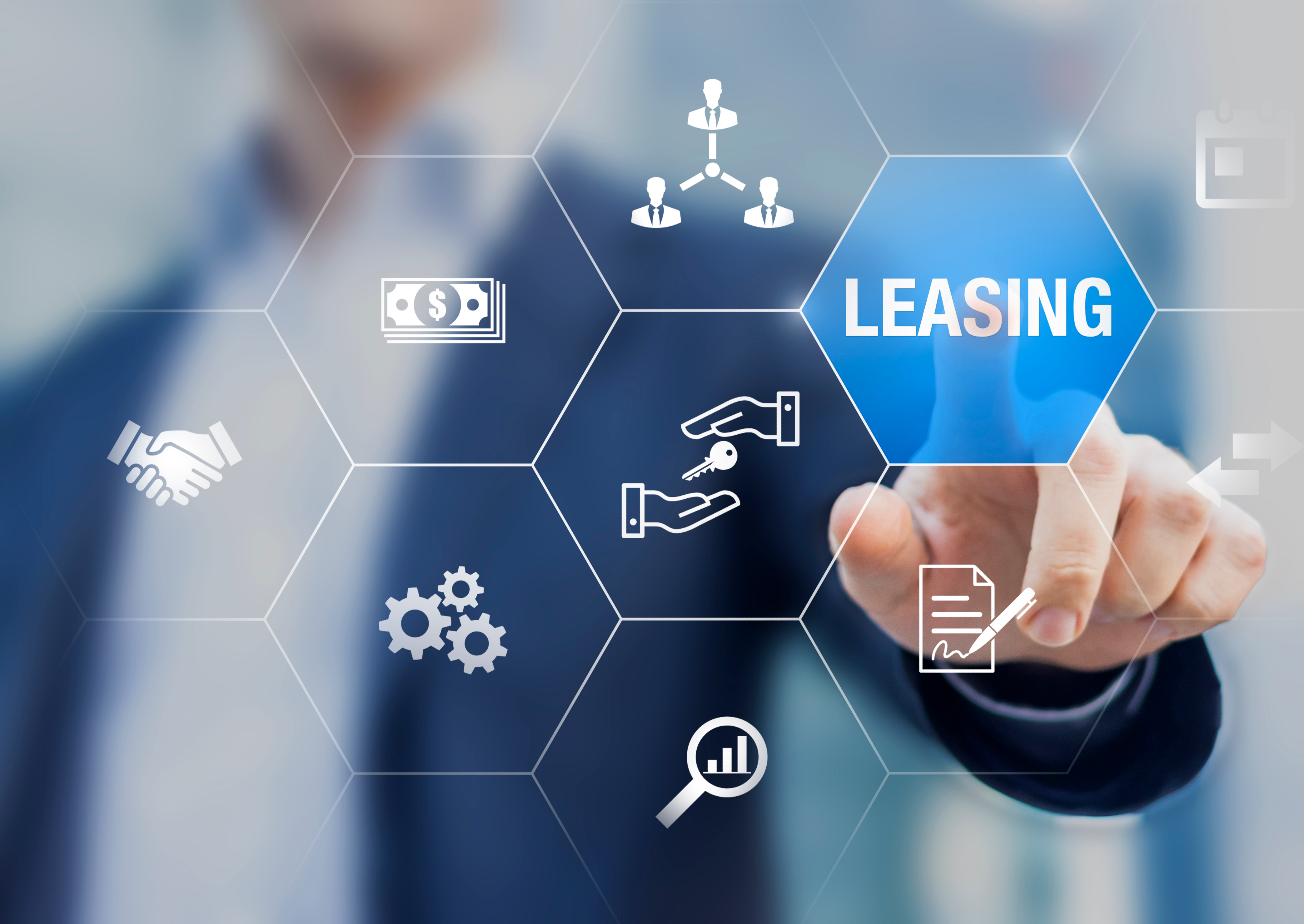 Image of man pointing to word "leasing"