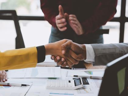 Photo of people shaking hands