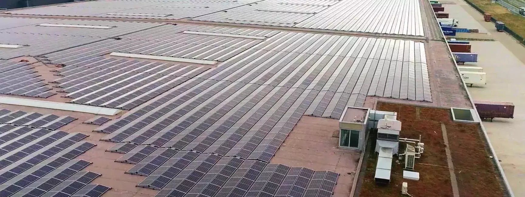 An aerial shot of solar panels on the roof of a building leased to Nippon Express and owned by W. P. Carey